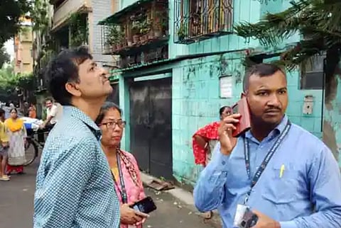 CBI officials outside Dr Sandip Ghosh's residence