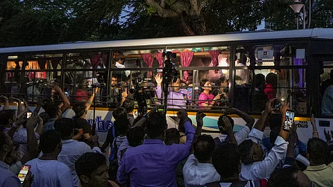 A delegation of junior doctors leaves in a bus from their dharna site near Swasthya Bhawan for a meeting with West Bengal Chief Minister Mamata Banerjee at her Kalighat residence, in Kolkata, West Bengal