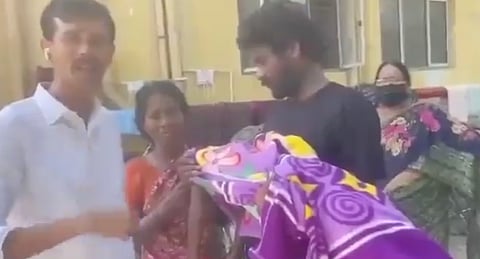 Parents with the dead body