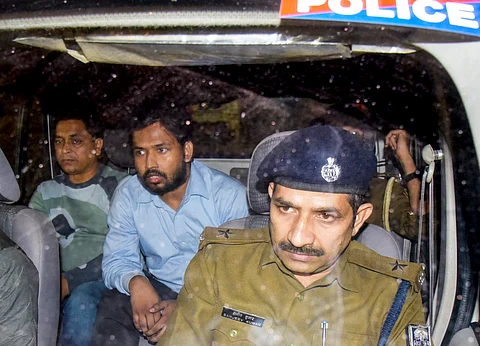 Tutor and YouTuber Khan Sir being detained after a protest on Friday