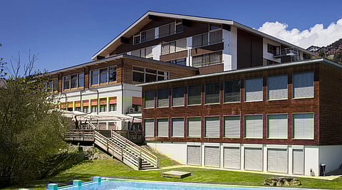 How does Les Roches' accreditation by Swiss Accreditation Council as a University of Applied Sciences help students