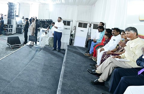 Naidu interacting with beneficiaries