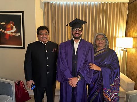 Dhruv Patil with his parents after receiving graduation in New York