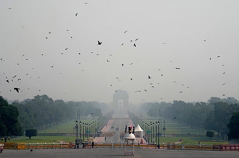 India Gate engulfed in a layer of smog, in New Delhi, Monday, Oct. 20, 2025. The national capital woke up to a layer of smog on Diwali morning with the city's air quality index (AQI) slipping into the 'very poor' category, as it crossed the 300-mark.