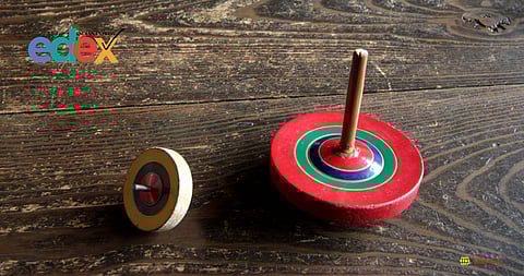 The game of spinning tops