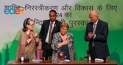 Congress leader Sonia Gandhi, left, presents the "Indira Gandhi Prize for Peace, Disarmament and Development for 2024" to former Chilean president Michelle Bachelet, center, at Jawahar Bhawan, in New Delhi.