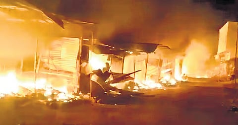 Classrooms briefly became living spaces for traders picking up the pieces after the blaze