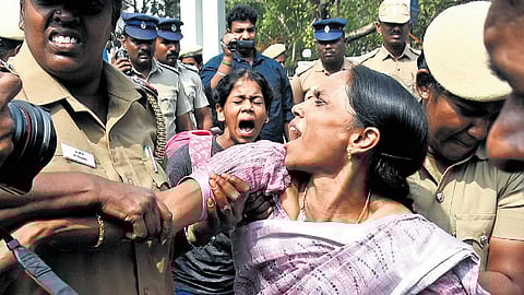 Police forcibly removed members of the Secondary Grade Seniority Teachers Association who attempted to block the road outside the Directorate of Public Instruction office at Nungambakkam, Chennai, on Friday
