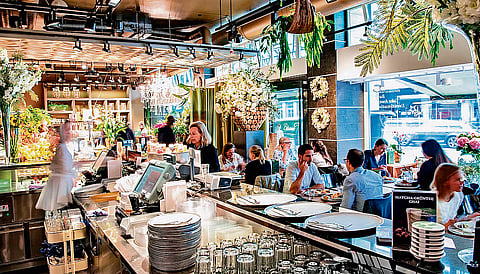 Patrons enjoying food at Hiltl