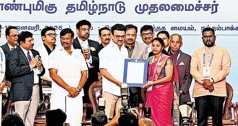 Chief Minister MK Stalin honouring members of the international Tamil community during the World Tamil Diaspora celebrations at Chennai Trade Centre.
