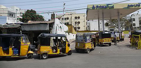 Auto drivers queue up to refill LPG at a gas station amid a shortage, as the fuel price rises by nearly Rs 35 in Hyderabad.