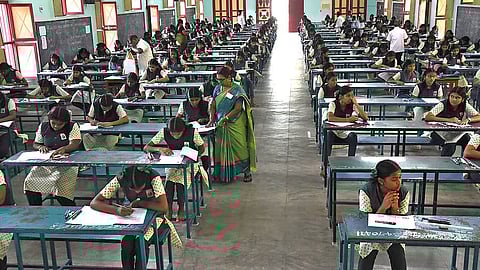 Students writing their SSLC examinations at St Annes girls higher secondary school in Tiruchy on Wednesday.