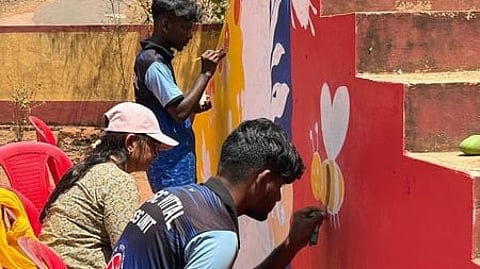 NSS volunteers of Government first grade college Vitla engaged in art work at Dakshina Kannada Zilla Panchayat Model Higher Primary School, Mudambail Bantwal during NSS annual camp