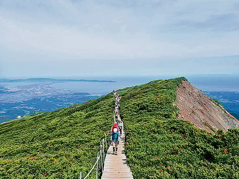 Tourists trekking Mount Daisen