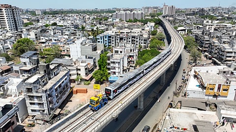 Surat: A metro train moves as part of the trial run after the completion of the 8.5 km viaduct between Dream City and Althan Tenement, marking a key milestone in the Surat Metro Rail Project, in Surat on Sunday, March 29, 2026. (Photo: IANS)
