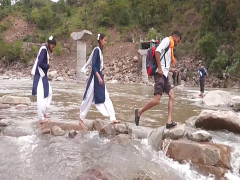J-K: Students risk lives crossing river after bridge collapse in Udhampur; residents seek urgent reconstruction