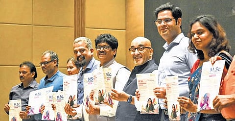 SRM University VC Ch Satish Kumar along with the university staff release the flying of newly introduced AI-Integrated M.Sc Economics and M.Sc Psychology courses during the press conference in Vijayawada on Wednesday.