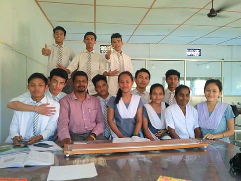 Physics professor Noah Eastman with his students in Karimganj, Assam