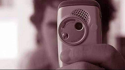 It is not a good feeling when someone takes your photo without your knowledge. We are sure you agree | Representational image | Courtesy: Firenewsfeed