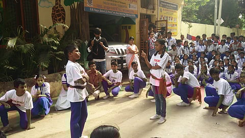 Students of Sri Siddhartha High School during their performance