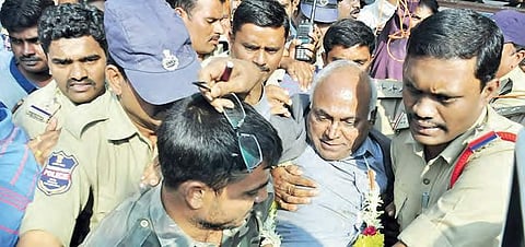 Kancha Illaiah being dragged away by the police two days ago