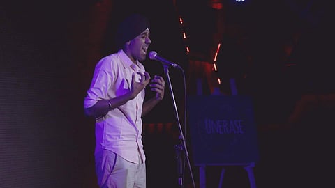 Simar Singh performing his poem The Legal Rapist
