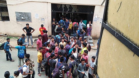 Over 100 people protested outside the college campus and demanded action against the administration