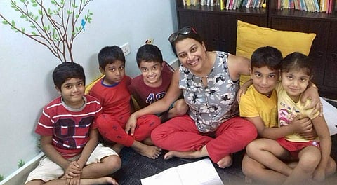 Divyaa with her students