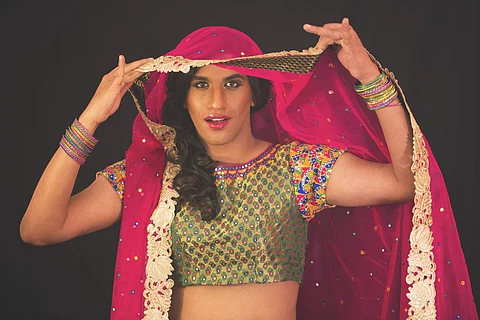 Alex performs as his alter ego Mayamma who has a story of her own
