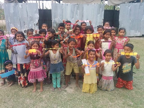 Kids show off the art the girls taught them to make | (Pic: Sarigama Yerra)