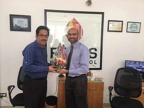 Minhaj Arastu (right), the principal of Focus High School