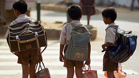 Students studying in higher classes carry books that go up to 60 kg, including workbooks and study materials (representative image) | AFP