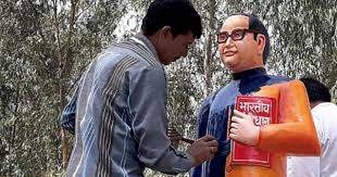 A freshly installed 5-feet-tall statue of the Dalit icon was installed in a Badaun village in saffron jacket but was promptly re-painted in blue after questions arose over the choice of a colour assoc