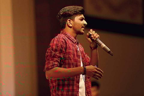 Ankush Jain beatboxing on stage