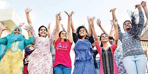 A group of students rejoice after the SSLC results were announced in Bengaluru on Monday | Pushkar v