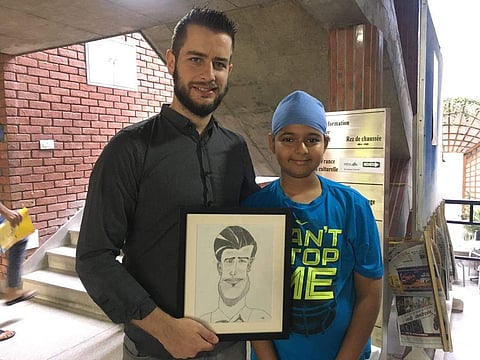 Hardit Singh, a twelve-year-old caricature artist from Chandigarh