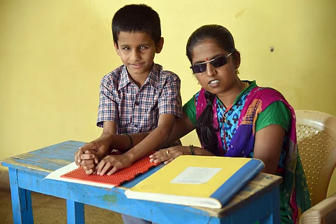 Ashwini with a student