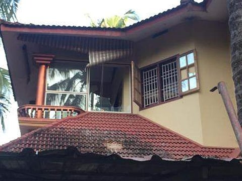 The crude bomb shattered the window panes of the balcony, and roof of the car porch of the house at Pollapoyil near Cheruvathur (Pic: Express)