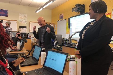 The Amazon founder was visiting a computer science class at Dunbar High School in Washington, DC (Pic: Google Images)