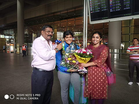 Apoorva with her coach and PE in-charge at her school (Pic: Apoorva Patil)