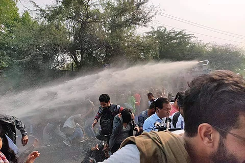 Delhi Police use water canon to disperse the crowd (pic: JNUSU)