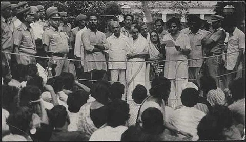 Sitaram Yechury standing next to Indira Gandhi and reading out the memorandum
