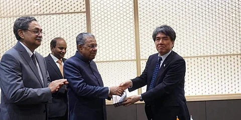 Chief Minister Pinarayi Vijayan with executive vice-president of Osaka University Genta Kawahara in Japan