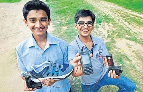 Anand and Mohak with the charger