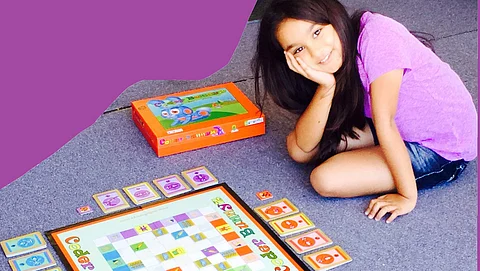 Samaira Mehta with her board game 'Coderbunnyz' that teaches kids how to code in a fun manner (Pic: Samaira)