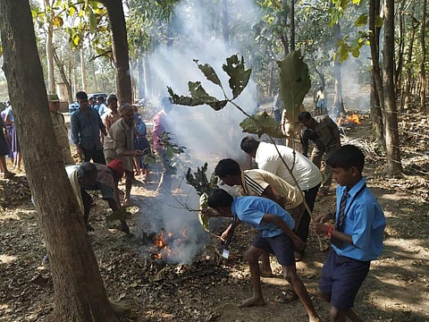 Children being trained to douse the fire in forest areas (Pic: Prashanth PKM)