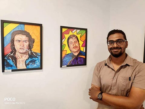 Varun Rao exhibiting his paintings at the DYU Art Café