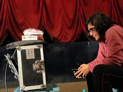 Roopa watching the movie scene while shooting Gantumoote
