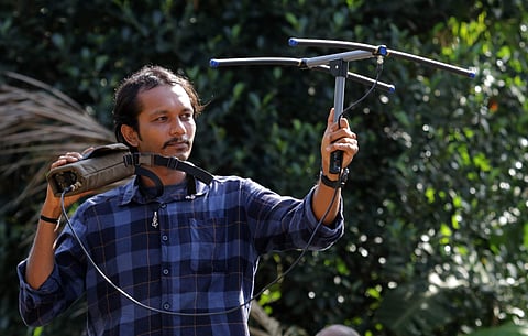 Ajay Giri using a device to track wild King Cobras in the Radio Telemetry Project (Pics: Shimoga Nandan)