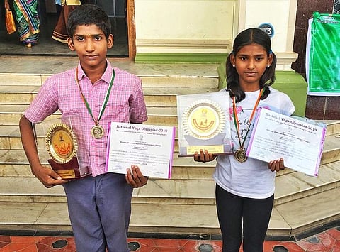 Janarthanan and Abarna Sree, both studying in government schools went on to win gold at the National Yoga Olympiad representing Tamil Nadu (Pic: Express)